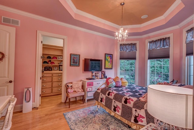 150 Old Woods Dr, Nicholasville, KY 40356 - bedroom featuring light wood finished floors, a tray ceiling, a chandelier, and ornamental molding