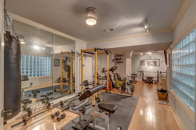 150 Old Woods Dr, Nicholasville, KY 40356 - workout area featuring ornamental molding and hardwood / wood-style floors