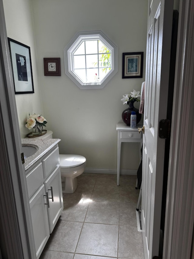 400 Natures Pointe Dr, Somerset, KY 42503 - bathroom with toilet, vanity, tile patterned flooring, and baseboards