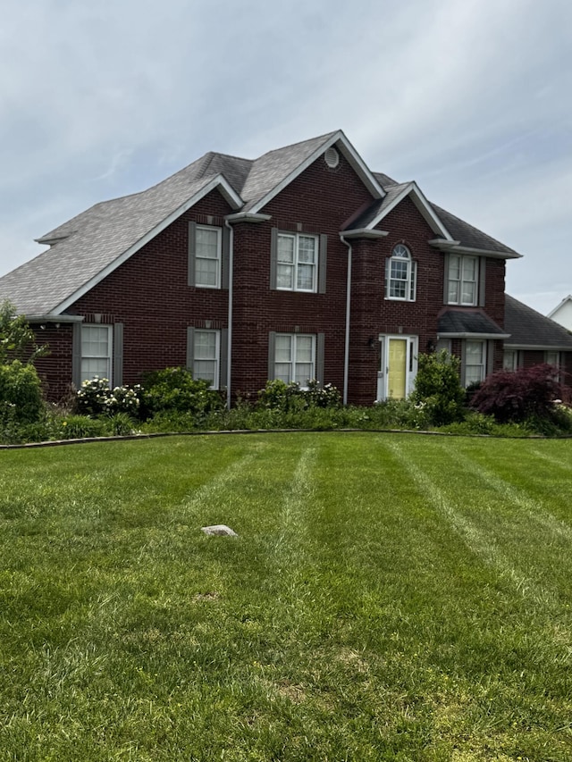 400 Natures Pointe Dr, Somerset, KY 42503 - view of front of house featuring brick siding, a front lawn, and roof with shingles