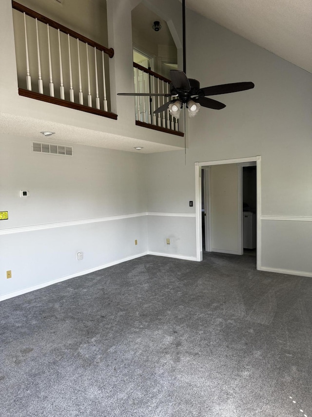 400 Natures Pointe Dr, Somerset, KY 42503 - unfurnished living room with high vaulted ceiling, a ceiling fan, and dark carpet