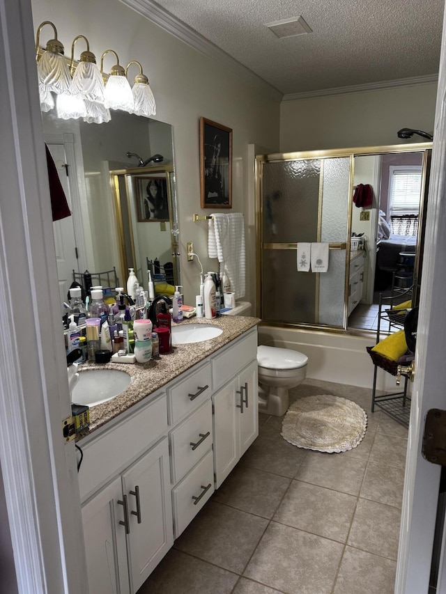 400 Natures Pointe Dr, Somerset, KY 42503 - bathroom featuring a textured ceiling, double vanity, combined bath / shower with glass door, ornamental molding, and tile patterned flooring