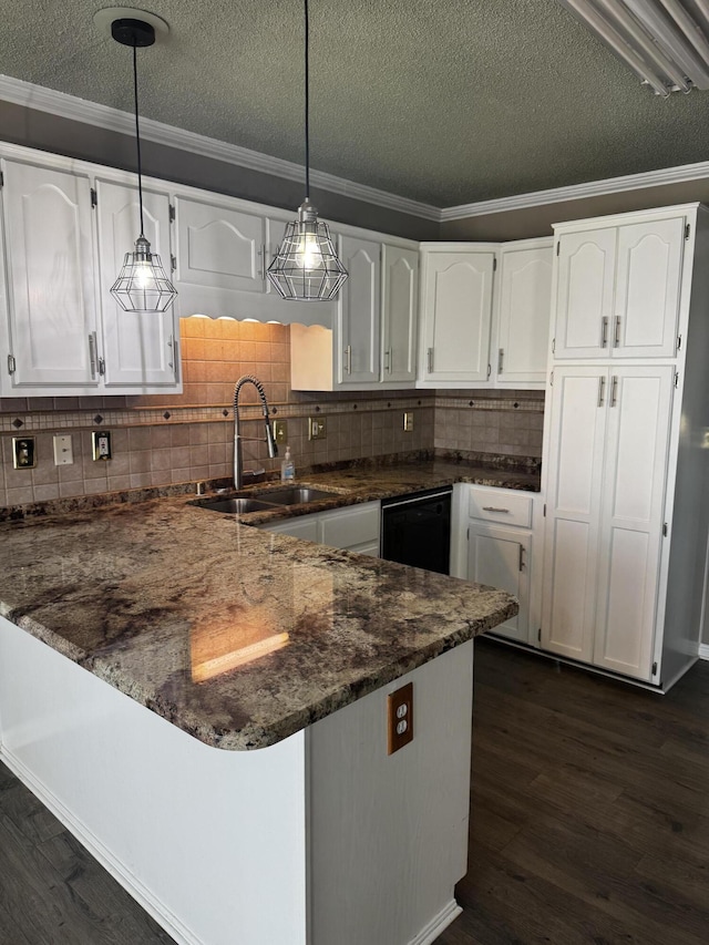 400 Natures Pointe Dr, Somerset, KY 42503 - kitchen featuring a peninsula, black dishwasher, white cabinets, dark wood finished floors, and hanging light fixtures