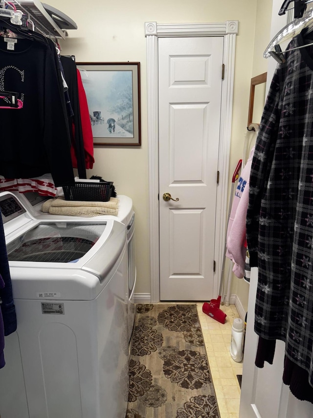 400 Natures Pointe Dr, Somerset, KY 42503 - clothes washing area with washing machine and clothes dryer, baseboards, and tile patterned floors