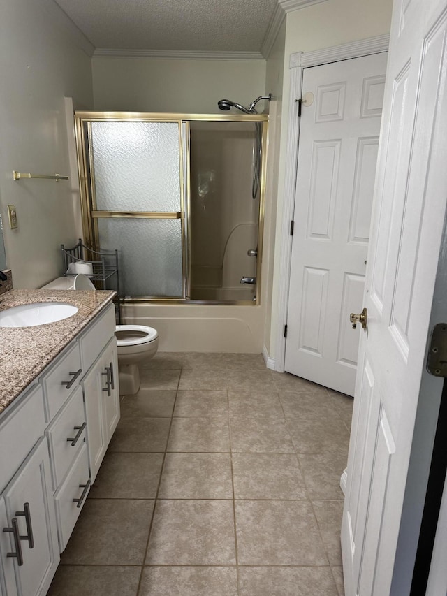 400 Natures Pointe Dr, Somerset, KY 42503 - full bathroom with ornamental molding, vanity, tile patterned floors, bath / shower combo with glass door, and a textured ceiling