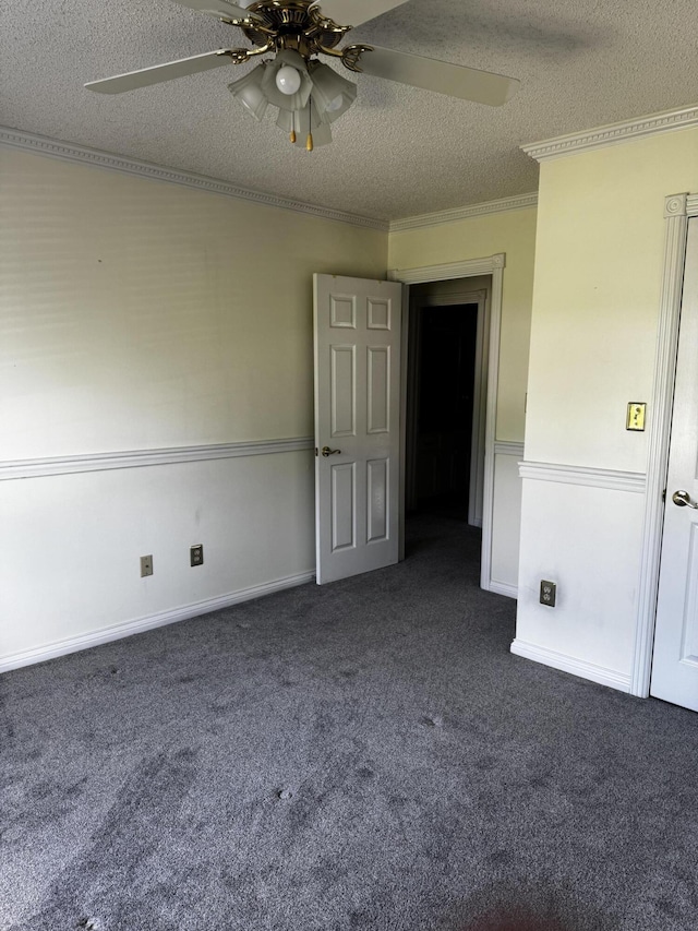 400 Natures Pointe Dr, Somerset, KY 42503 - spare room featuring a ceiling fan, dark carpet, a textured ceiling, and ornamental molding