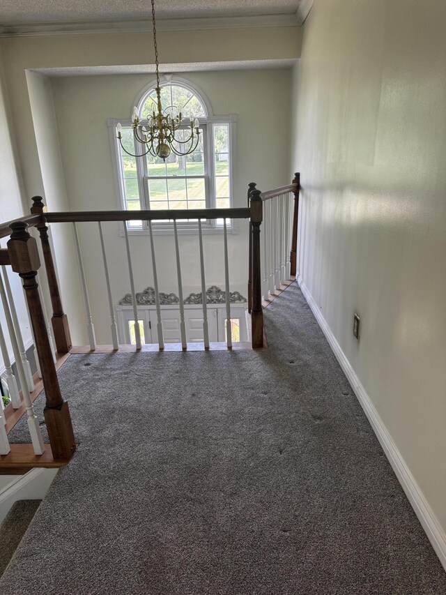400 Natures Pointe Dr, Somerset, KY 42503 - staircase featuring carpet flooring, a chandelier, a textured ceiling, and ornamental molding