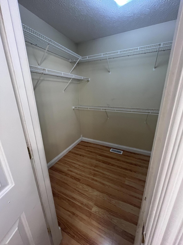 361 Puncheon Camp Rd, Russell Springs, KY 42642 - walk in closet with wood finished floors