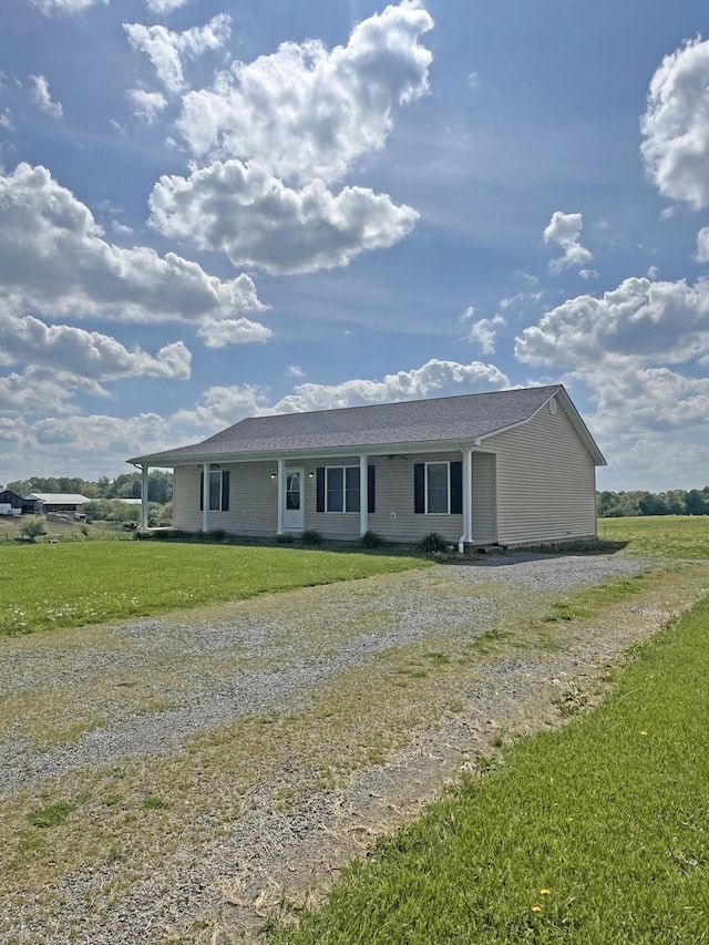 361 Puncheon Camp Rd, Russell Springs, KY 42642 - ranch-style house featuring gravel driveway and a front lawn