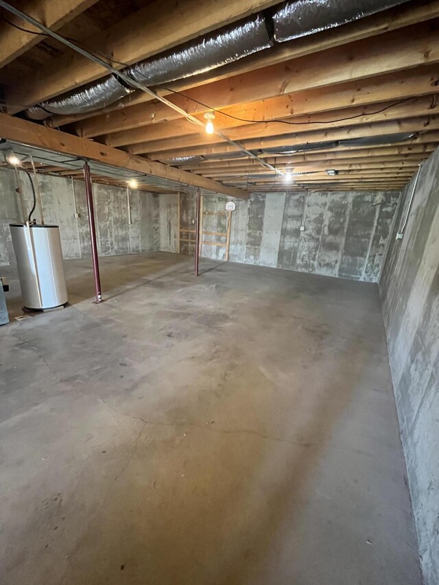 361 Puncheon Camp Rd, Russell Springs, KY 42642 - unfinished basement featuring water heater