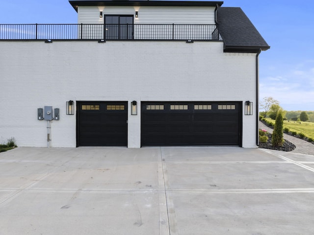 4349 Ravens Crest Ln, Lexington, KY 40515 - view of side of property with a garage, driveway, and brick siding