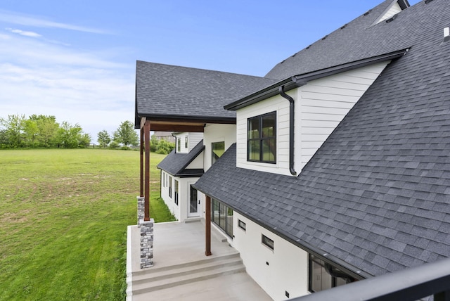 4349 Ravens Crest Ln, Lexington, KY 40515 - view of side of home with roof with shingles and a yard