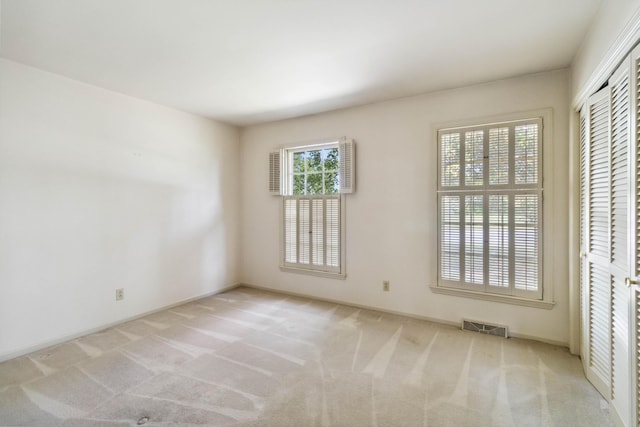 spare room with carpet floors