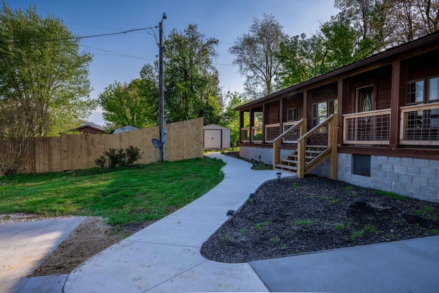 740 N Main St, Stanton, KY 40380 - view of yard featuring a storage shed and an outbuilding
