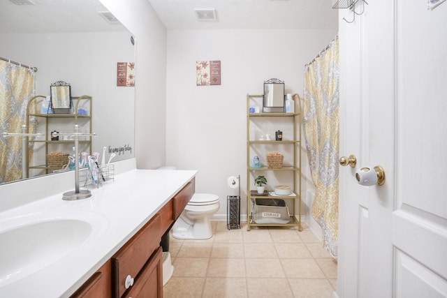 3065 Caddis Ln, Lexington, KY 40511 - full bath featuring toilet, vanity, and tile patterned flooring
