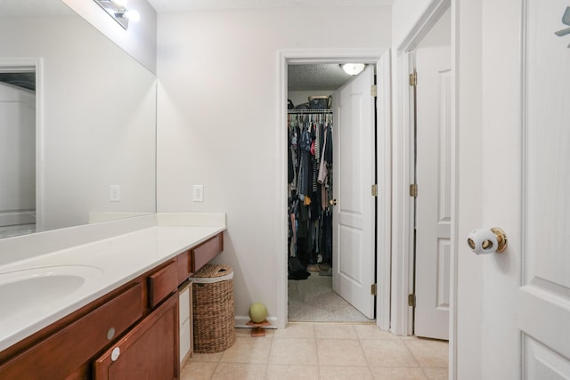 3065 Caddis Ln, Lexington, KY 40511 - bathroom featuring vanity and a spacious closet