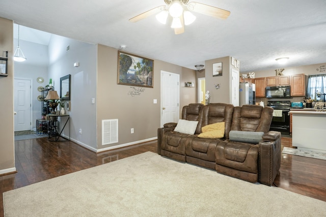3065 Caddis Ln, Lexington, KY 40511 - living area with a ceiling fan, dark wood-style flooring, and baseboards