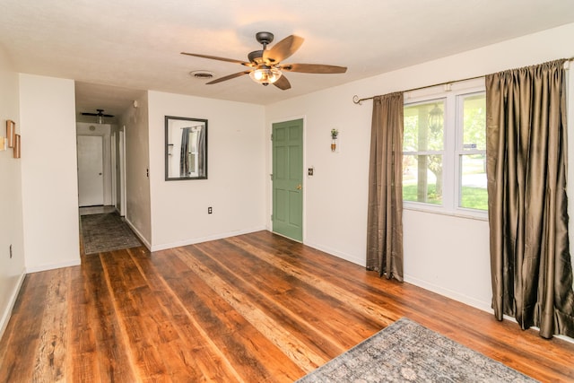 1102 Iroquois Dr, Mt Sterling, KY 40353 - unfurnished room with a ceiling fan, wood finished floors, and baseboards