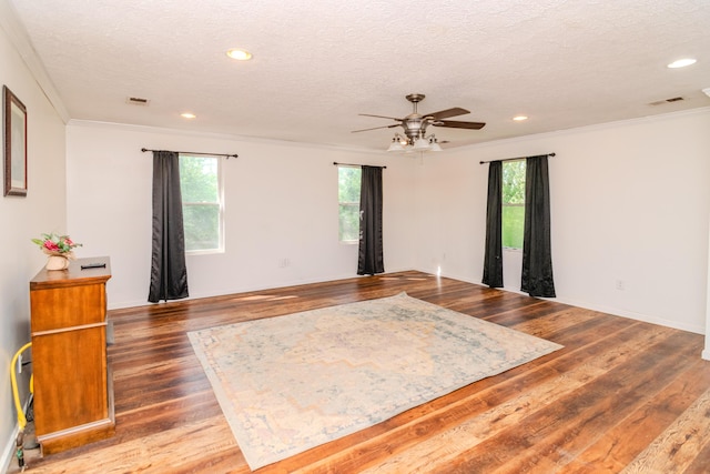 1102 Iroquois Dr, Mt Sterling, KY 40353 - spare room with ceiling fan, wood finished floors, crown molding, a textured ceiling, and plenty of natural light