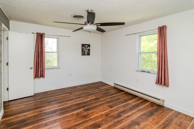 1102 Iroquois Dr, Mt Sterling, KY 40353 - unfurnished room with baseboard heating, wood finished floors, and healthy amount of natural light