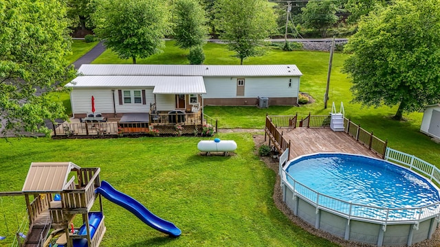 199 Langnau Rd, London, KY 40741 - rear view of house with a deck, a playground, and metal roof