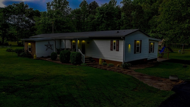 199 Langnau Rd, London, KY 40741 - view of front of house with a front yard, metal roof, and a playground