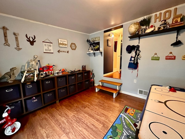 199 Langnau Rd, London, KY 40741 - recreation room featuring wood finished floors, ornamental molding, and baseboards