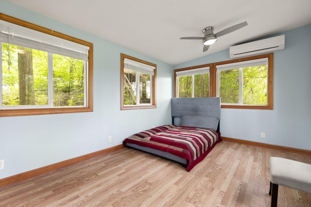571 Whitlock Rd, Richmond, KY 40475 - bedroom with an AC wall unit, multiple windows, baseboards, and lofted ceiling