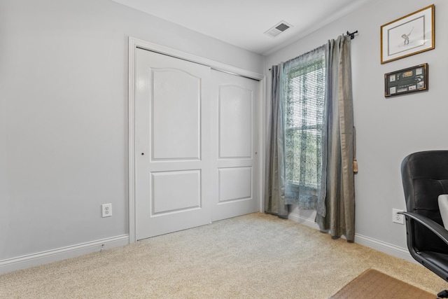 office area with carpet flooring and baseboards