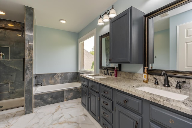 full bathroom with a shower stall, marble look tile flooring, a garden tub, and double vanity
