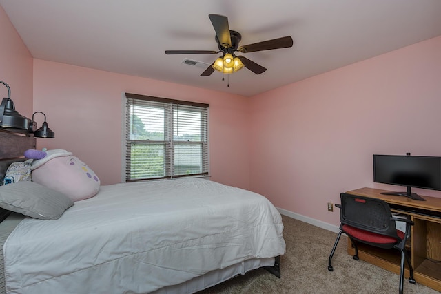 bedroom featuring carpet floors, a ceiling fan, and baseboards