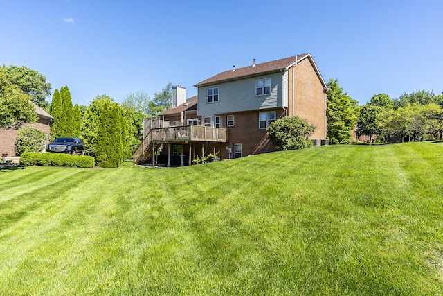 4120 Amberwood Ct, Lexington, KY 40513 - back of house featuring stairs, a deck, a yard, and a chimney