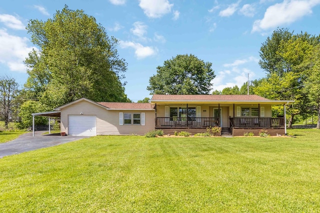 6362 E Laurel Rd, London, KY 40741 - ranch-style house with a porch, asphalt driveway, an attached garage, a front lawn, and a carport