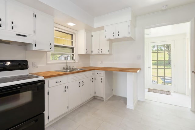 6362 E Laurel Rd, London, KY 40741 - kitchen featuring range with electric cooktop, under cabinet range hood, a sink, white cabinetry, and healthy amount of natural light