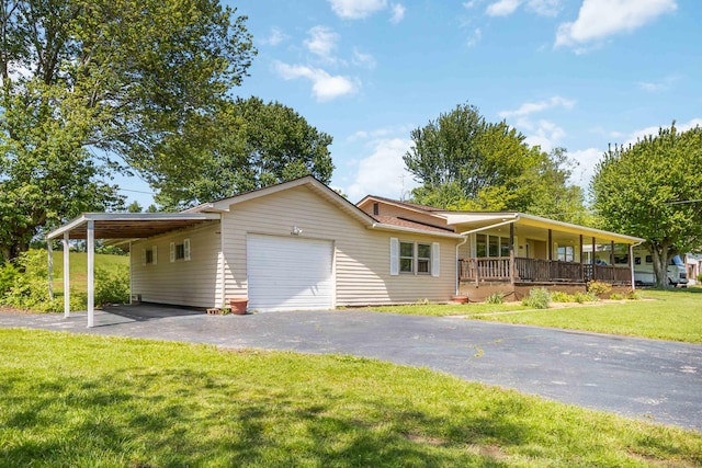 6362 E Laurel Rd, London, KY 40741 - view of front facade with asphalt driveway, a front yard, an attached garage, and a porch