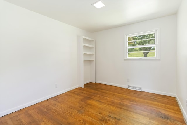 6362 E Laurel Rd, London, KY 40741 - empty room featuring light wood-style floors and baseboards