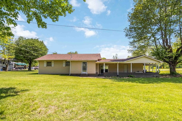 6362 E Laurel Rd, London, KY 40741 - rear view of property with a lawn