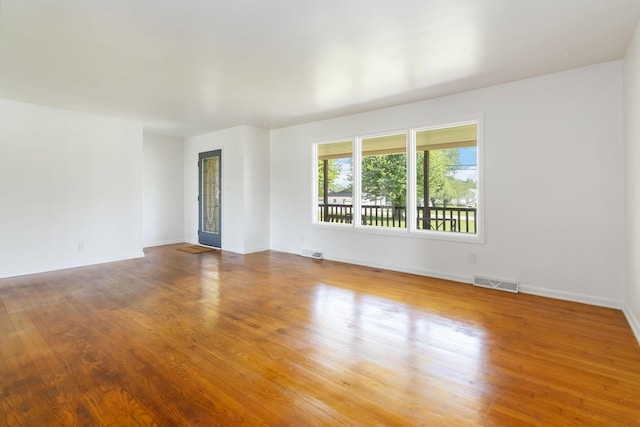 6362 E Laurel Rd, London, KY 40741 - unfurnished room featuring wood finished floors and baseboards
