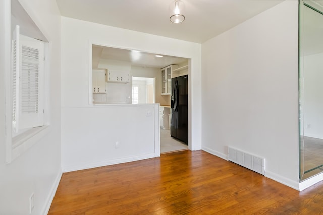 6362 E Laurel Rd, London, KY 40741 - unfurnished room with wood finished floors and baseboards