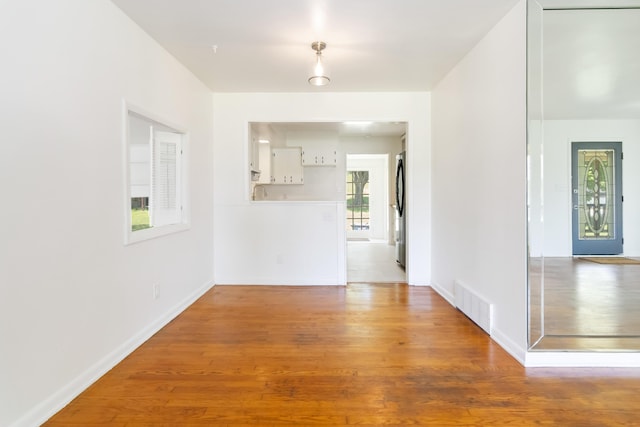 6362 E Laurel Rd, London, KY 40741 - empty room with wood finished floors and baseboards