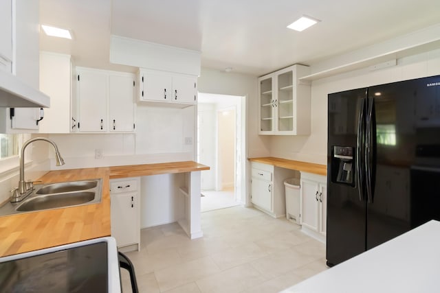 6362 E Laurel Rd, London, KY 40741 - kitchen featuring wood counters, a sink, and black fridge with ice dispenser