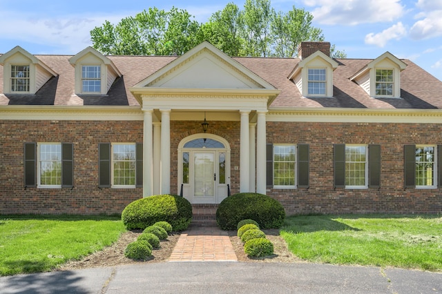 1373 Delong Cir, Lexington, KY 40515 - view of front of property featuring a shingled roof, brick siding, and a chimney