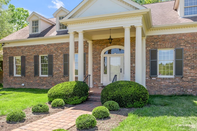 1373 Delong Cir, Lexington, KY 40515 - entrance to property with a shingled roof, a lawn, and brick siding