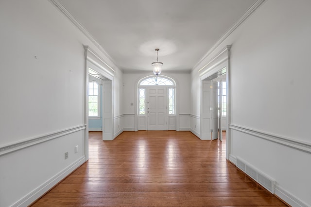 1373 Delong Cir, Lexington, KY 40515 - entryway with ornamental molding, hardwood / wood-style floors, and wainscoting