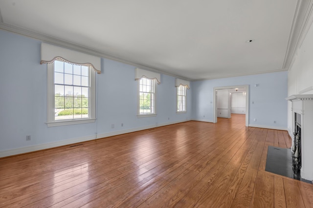 1373 Delong Cir, Lexington, KY 40515 - unfurnished living room with crown molding, light wood-style floors, a fireplace with flush hearth, and baseboards