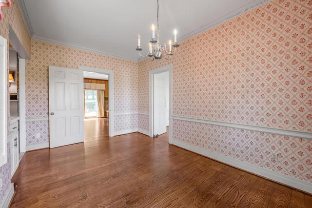 1373 Delong Cir, Lexington, KY 40515 - empty room featuring crown molding, wood finished floors, a chandelier, wallpapered walls, and baseboards
