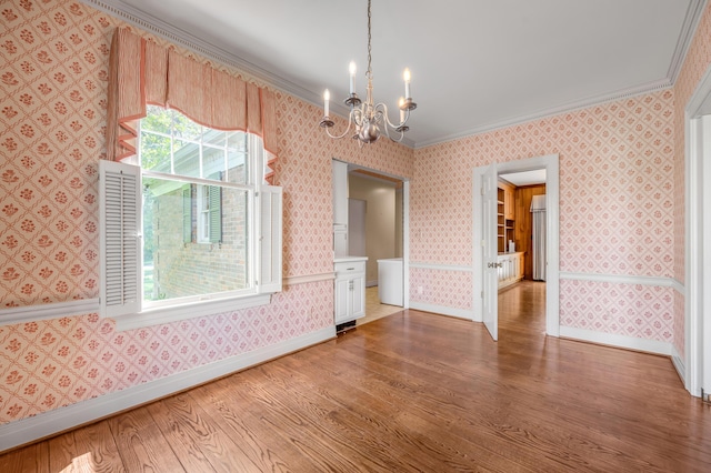 1373 Delong Cir, Lexington, KY 40515 - unfurnished dining area with light wood-style floors, a chandelier, crown molding, baseboards, and wallpapered walls