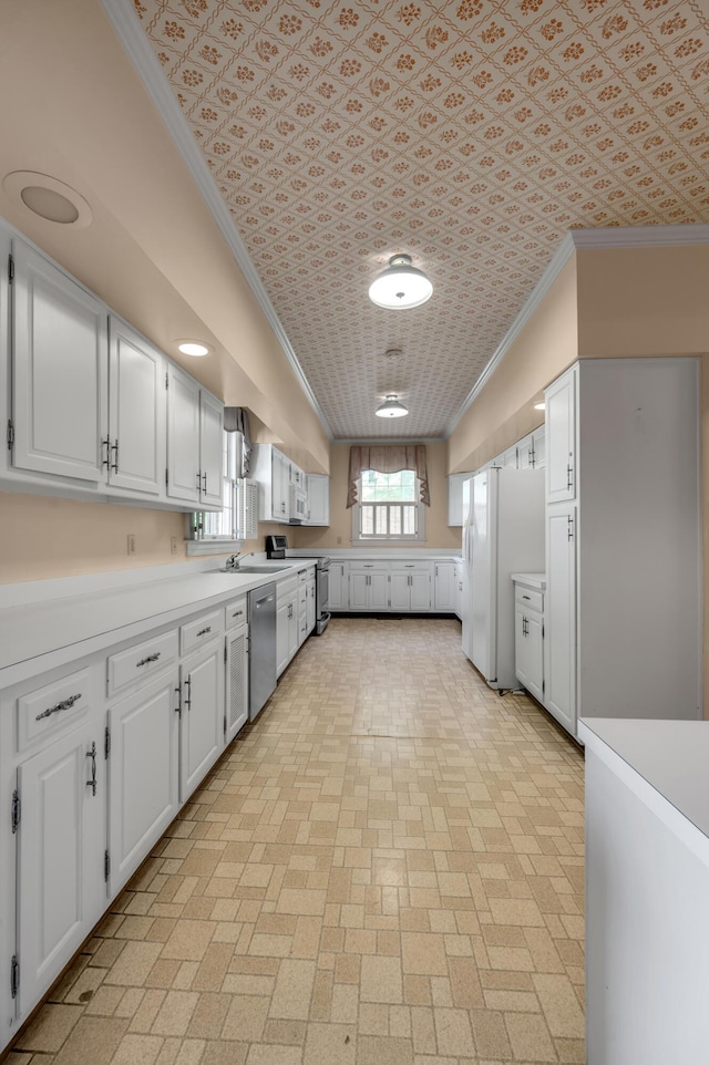 1373 Delong Cir, Lexington, KY 40515 - kitchen featuring crown molding, appliances with stainless steel finishes, an ornate ceiling, white cabinetry, and light countertops