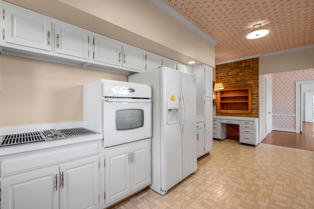 1373 Delong Cir, Lexington, KY 40515 - kitchen with white appliances, ornamental molding, wallpapered walls, white cabinets, and light countertops