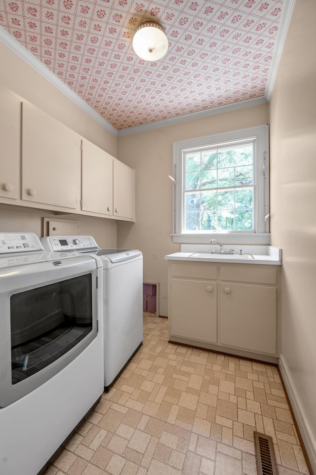 1373 Delong Cir, Lexington, KY 40515 - laundry area featuring washer and clothes dryer, cabinet space, crown molding, and an ornate ceiling